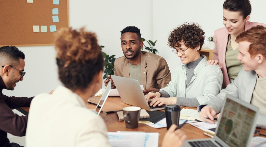  Team using DISC assessment for workplace collaboration success